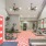 fitness room with workout equipment and pink door